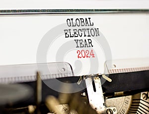 Global election year 2024 symbol. Concept words Global election year 2024 typed on beautiful old retro typewriter. Beautiful white