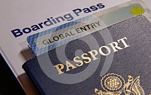 Global Entry Card with USA Passport and Airline Boarding Pass photo