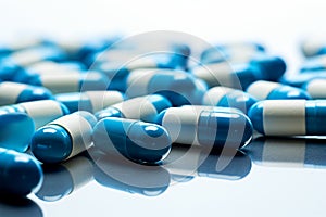 Global health concept blue and white pills on a white background