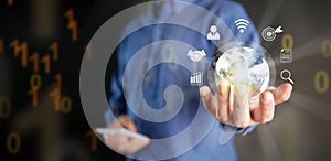 Global internet connection concept. Internet usage worldwide in business and technology. A man hand holds virtual globe with