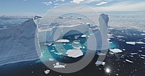 Global issue of climate change and melting icebergs on South Pole aerial. Antarctica environment photo