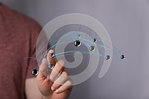 Abstract image of a hand interacting with a digital network. Perfect for technology, connection, and innovation concepts