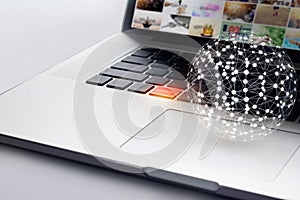 Global network and payment button on laptop, shopping online concept