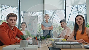 Global virtual group meeting at office pov view. Diverse team looking web camera