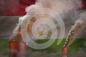 Global warming concept - dense smoke from industry pipes on Tajikistan flag background with space for your content - industrial 3D