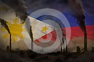Global warming concept - heavy smoke from industrial chimneys on Philippines flag background with place for your text - industrial