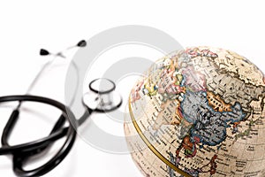 Globe (Asia ) and stethoscope