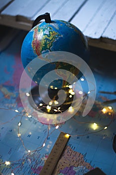 Globe on the background of the world map.