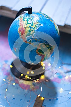 Globe on the background of the world map.