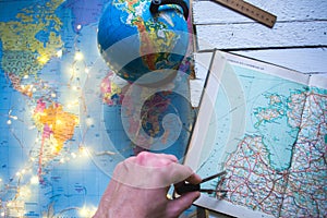 Globe on the background of the world map.