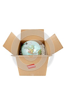 Globe in a box with a fragile sticker