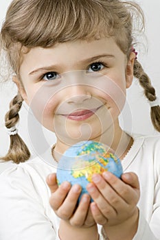 Globe on child hands