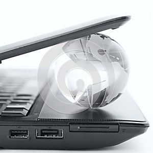 Globe on a laptop keyboard