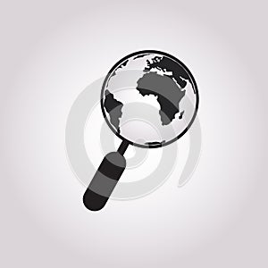 Globe with magnifying glass icon. Planet earth and magnifier. Search concept icon