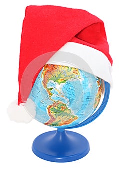 Globe with a Santa Claus hat