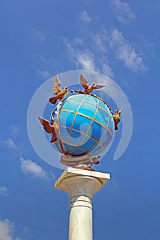 Globus Globe Monument on Independence Square, Kyiv, Ukraine photo