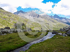 Gloedis - Idyllic river with scenic view of majestic mountain ridges of High Tauern seen near Gloedis in Schober group