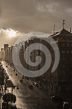 Gloomy city street during a downpour