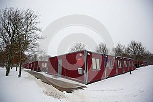 Gloomy container housing in winter