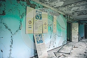 Gloomy corridor with broken window frames and debris