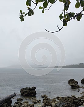Gloomy hazy beach in the morning