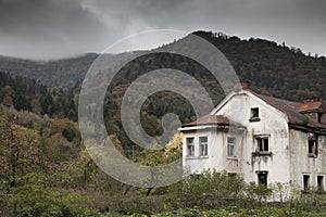 Gloomy house in the woods