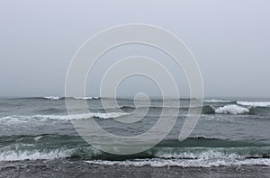 A gloomy landscape - Khalaktyrsky beach in stormy weather, Pacific ocean, Kamchatka Peninsula