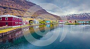 Gloomy morning cityscape of small fishing town - Seydisfjordur. Adorable  summer scene of east west Iceland, Europe.