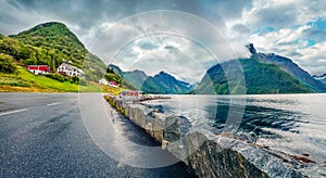 Gloomy morning scene of Hjorundfjorden fjord, Orsta municipality, More og Romsdal county. Picturesque summer view of Norway. Trave