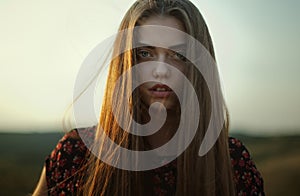 Gloomy portrait of young woman