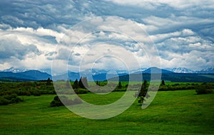 Gloomy submontane landscape with clouds