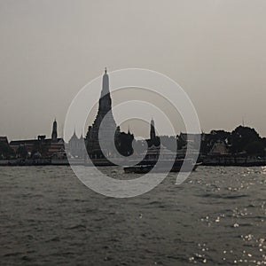 Gloomy Wat Arun Thailand from the river