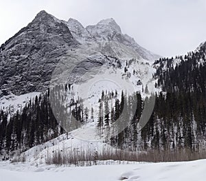 Gloomy weather in winter mountains