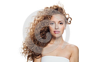 Glorious female face. Young blonde woman on white background