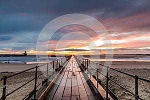 A glorious morning at Blyth beach, with a beautiful sunrise over the old wooden Pier stretching out to the North Sea