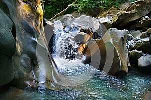 Glorious refreshing waterfalls on mountain stream