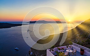 Glorious sunset in Oia village on Santorini island, Greece, panoramic image