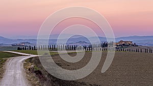 Glorious sunset over the Tuscan countryside in Ville di Corsano, Siena, Italy