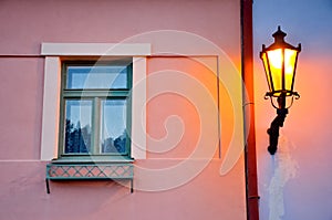 Glory lamp and the window in old city