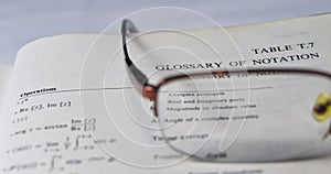 Glossary of the notations on a school and university textbook photo