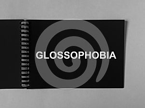 Glossophobia word. Fear of public speaking