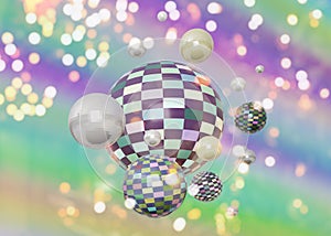 Glossy checkered spheres on multicolored background with blurry lights