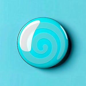 Glossy circular button shining on light blue background