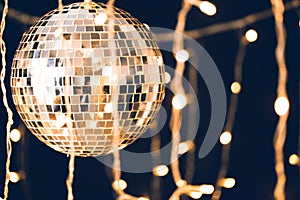 glossy disco ball with garland