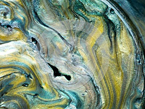 Glossy pearlescent pigments mixed with oil, detail