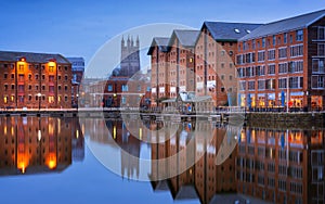 Gloucester docks and Cathedral reflected in the quay on Sharpness at twilight