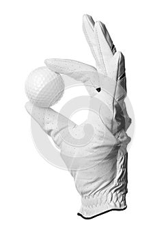 Glove and golf ball on white