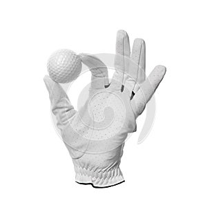 Glove and golf ball on white