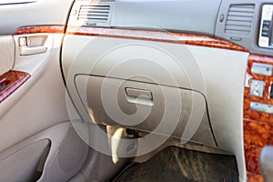 Glovebox compartment in a car of beige interior