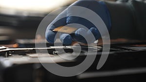 Gloved Hand Handling Computer Processor Chip